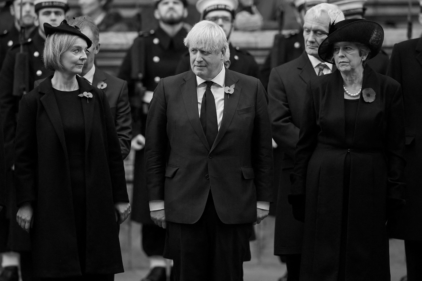 Les anciens premiers ministres britanniques Liz Truss, Boris Johnson et Theresa May.