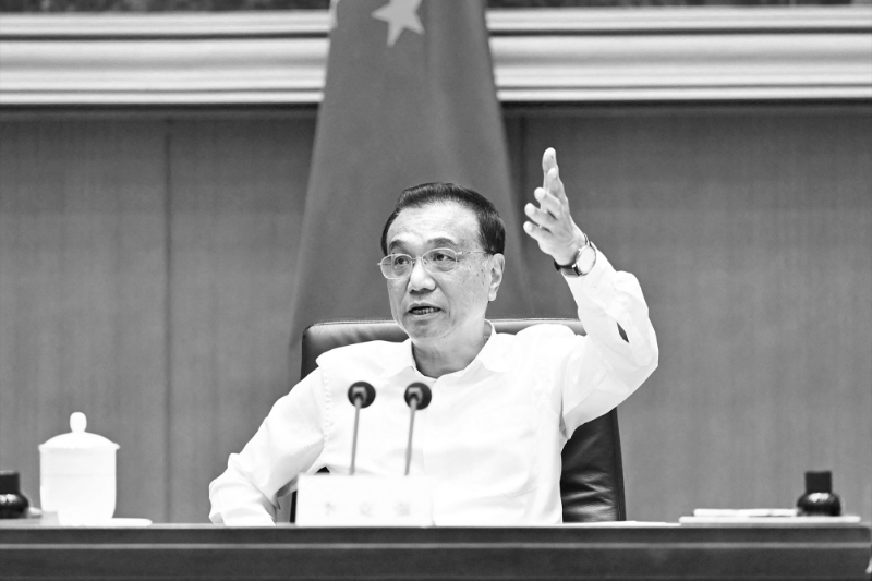 Le premier ministre Li Keqiang s'exprimant lors d'une visioconférence sur l'économie, le 25 mai 2022.